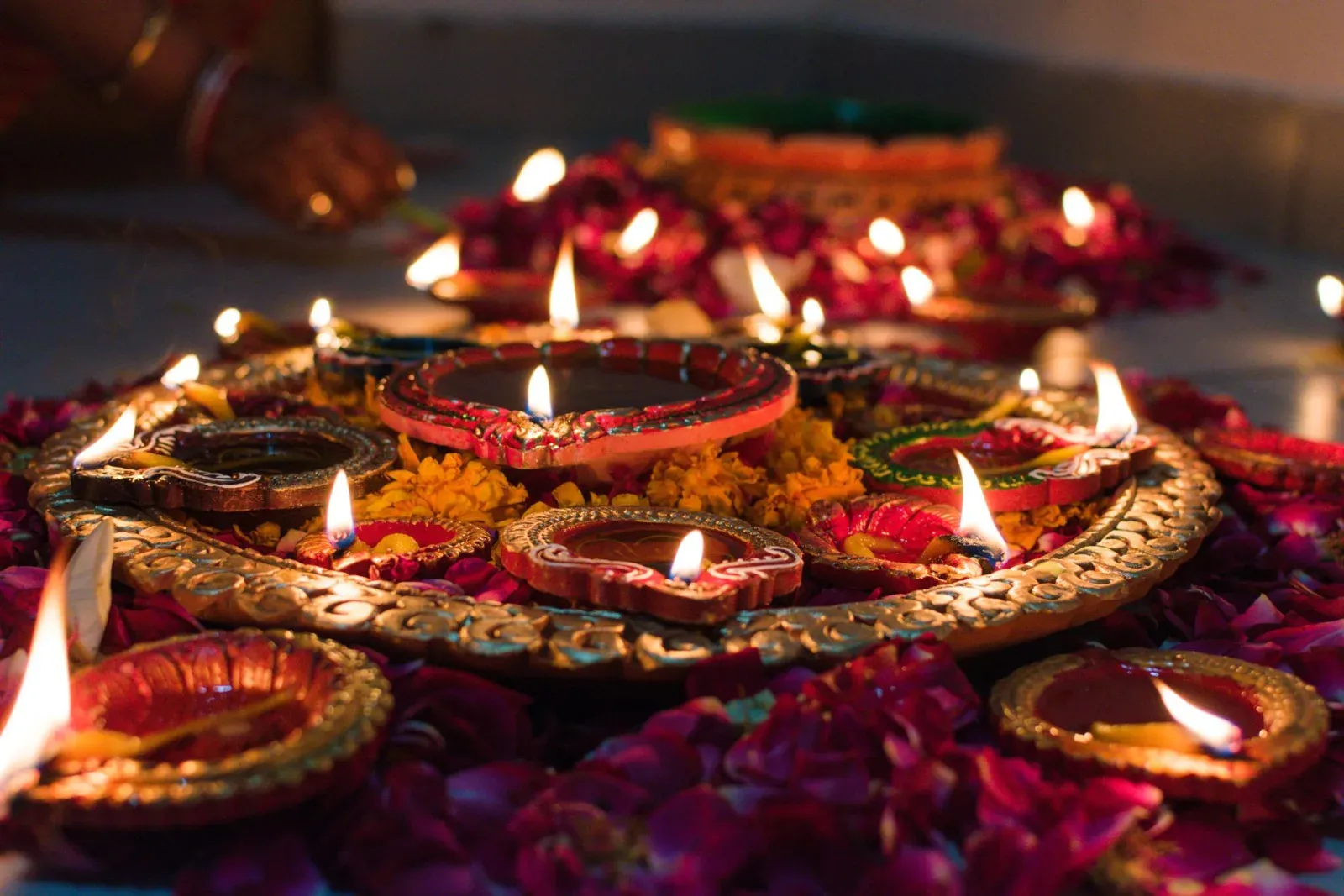 Diwali diyas glowing in a clean home