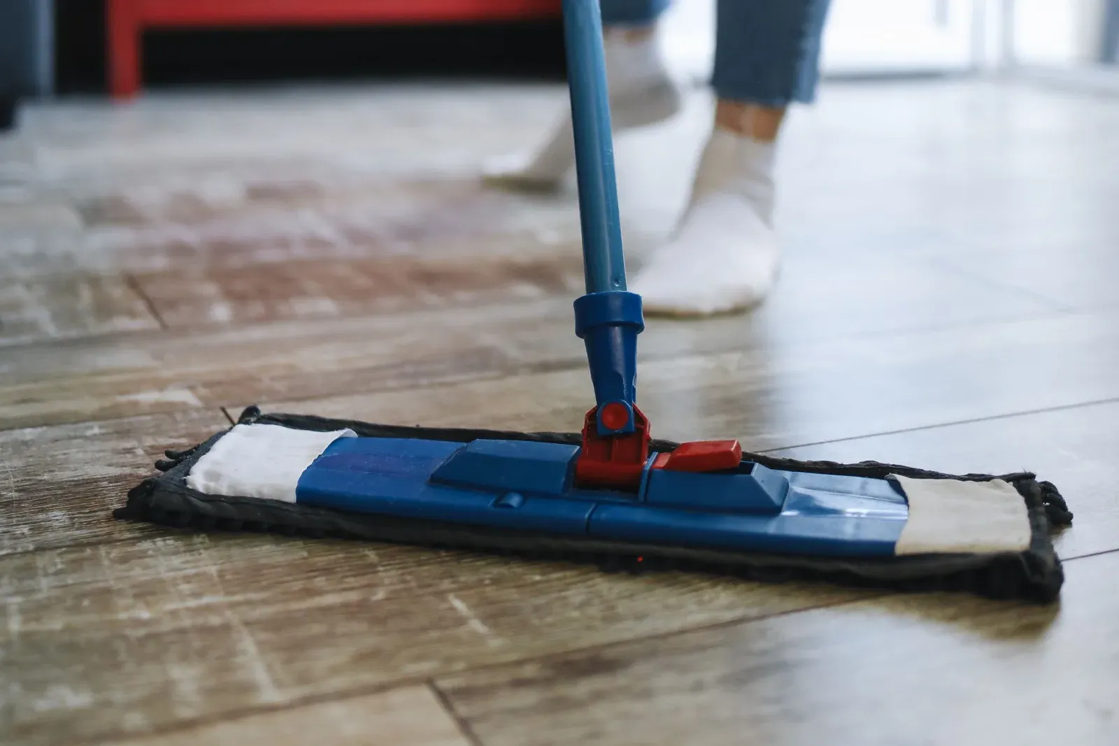 Mopping a wooden floor at home